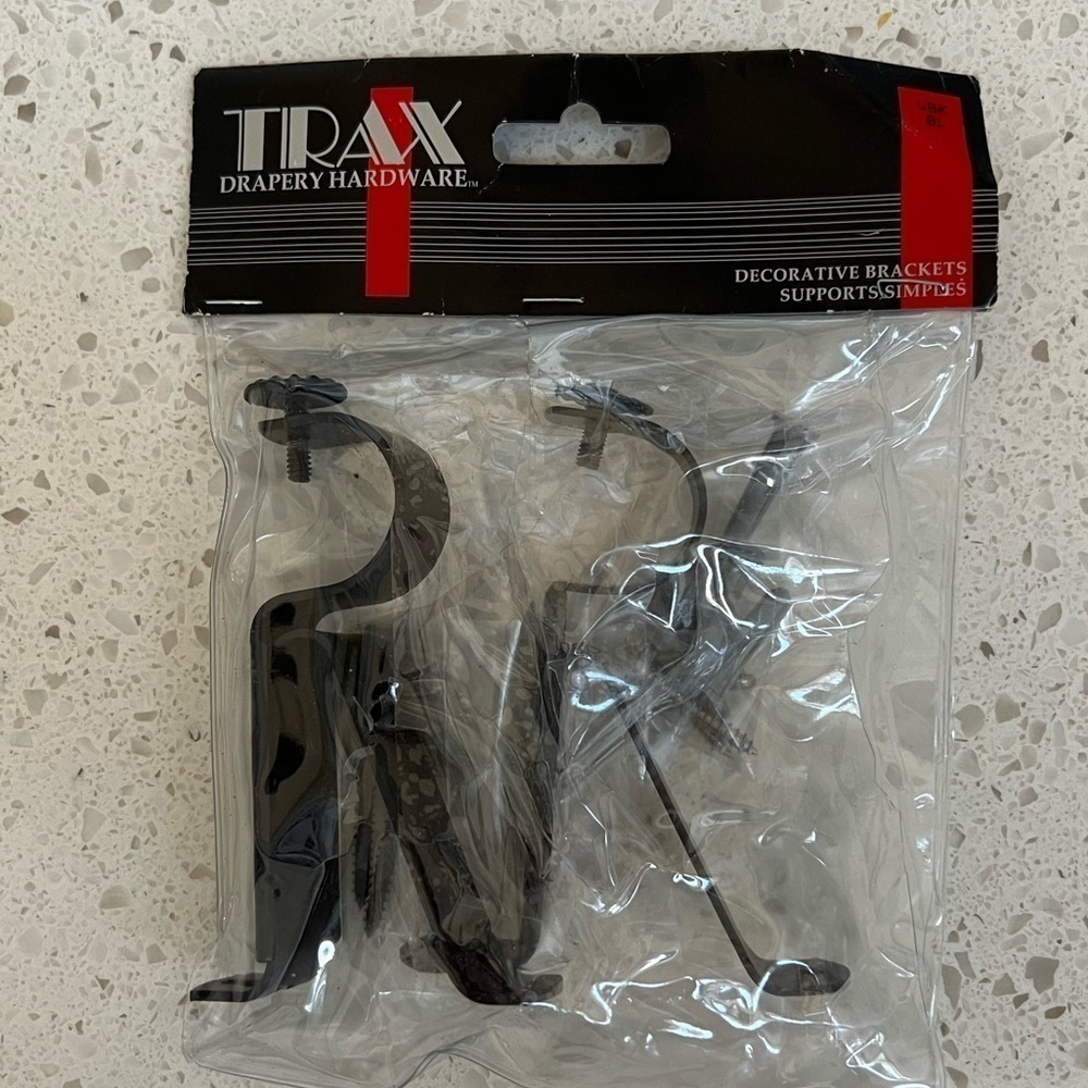 New Decorative drapery brackets in black